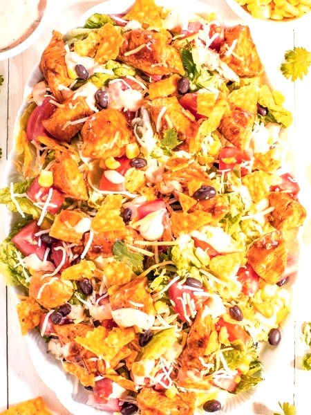 Loaded Chicken Taco Salad with Creamy Lime-Cilantro DressingSource